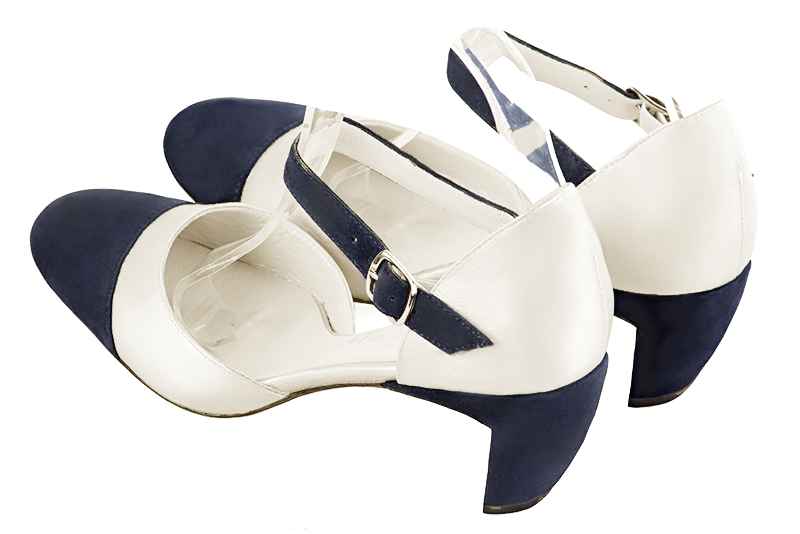 Navy blue and off white women's open side shoes, with an instep strap. Round toe. Medium comma heels. Rear view - Florence KOOIJMAN